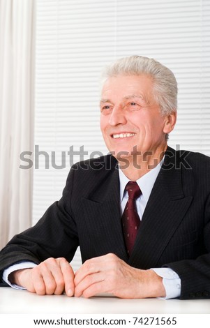 Portrait of a happy business man on a white