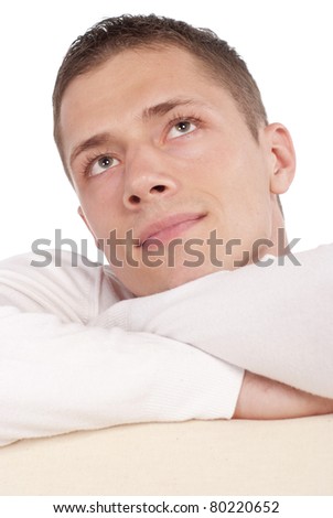 smart guy in white clothes posing on white background