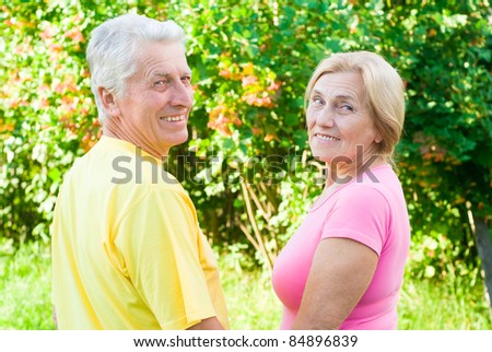 portrait of an old cute couple at nature