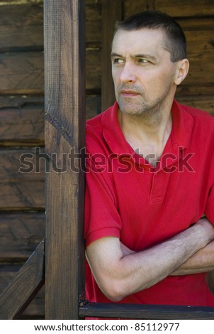 portrait of a cute guy posing outside