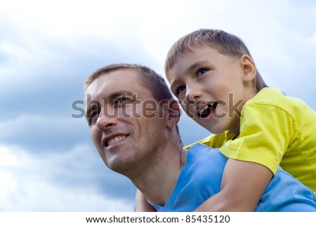 portrait of a cute dad with son