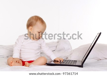 beautiful child to learn to work with your computer