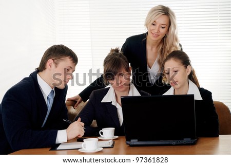 Teams of four people working on a white background