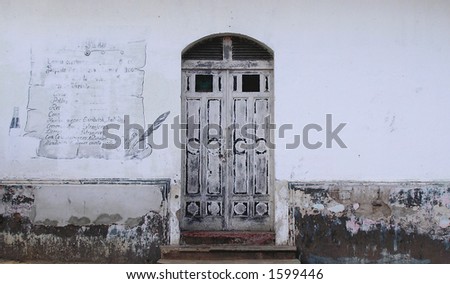 old faded menu and door