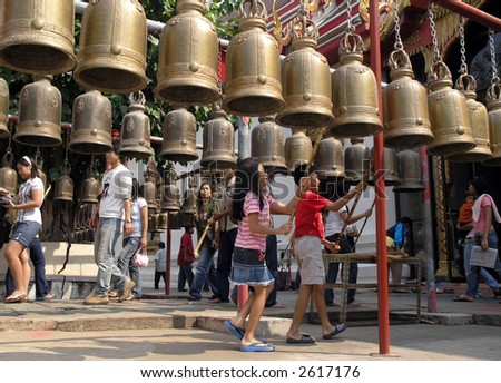 children ringing the bells thailand