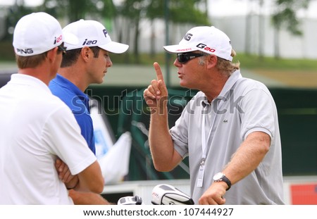 LE GOLF NATIONAL, PARIS, FRANCE, JULY 05 , 2012 Julien Quesne and coach Ducoulombier (FRA) at The French open, European tour, July 05, 2012 at The Golf National, Albatros course, Paris, France.