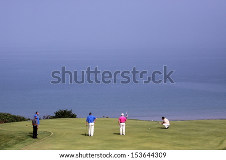 PLENEUF VAL ANDRE , FRANCE Ã¢Â?Â? SEPTEMBER 04, 2013 :roup of players on hole 10 during thte pro-am  at The Blue Green  golf challenge , september 04, 2013 at The Pleneuf Val Andre golf,  France..
