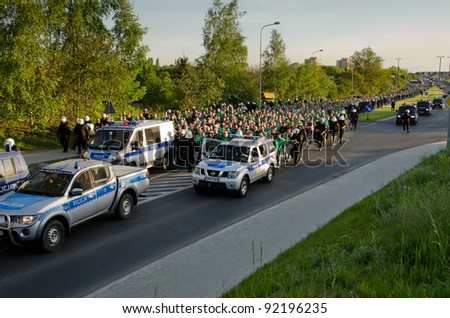 LUBIN, POLAND - MAY 10, 2011: Fans of Slask Wroclaw are escorted by the Police to the stadium before the Polish Premier League match between KGHM Zaglebie Lubin - WKS Slask Woclaw.