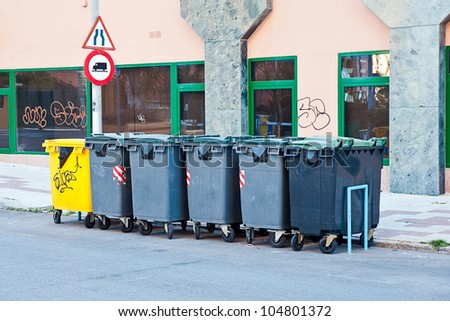 Plastic bins in a street