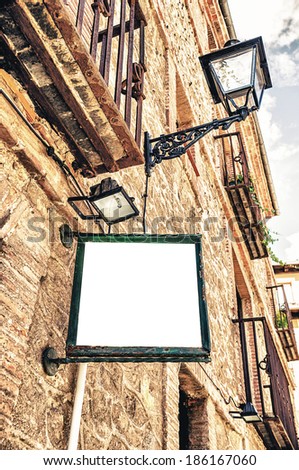 street in Segovia, Spain. Billboard