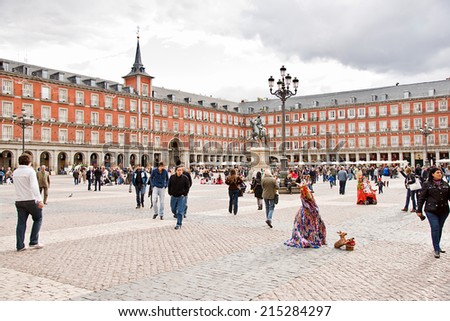 MADRID - APRIL 20: The Plaza Mayor, tourists people enjoy spring evening at square, visited by thousands of tourists on April 20,2012 in Madrid,Spain.This square was inaugurated in 1620 by Felipe III