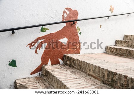 GENALGUACIL, SPAIN - SEPTEMBER 07: View of historic center on September 07, 2014 in Genalguacil, Spain.Artists doing different pieces of art that also leave permanently exposed in the streets.