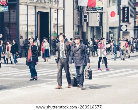 TOKYO, JAPAN - MARCH 20: Ginza district on March 20, 2015 in Tokyo, Japan. It is one of the world\'s best known shopping districts.