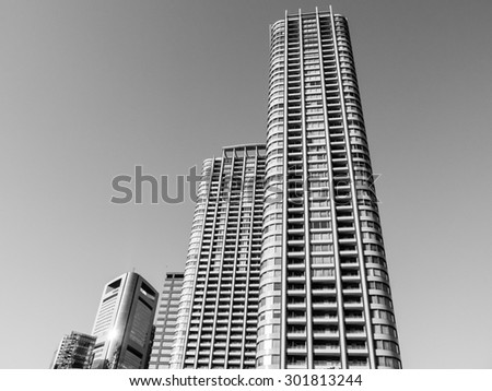 TOKYO; JAPAN - MARCH 30: Shiodome district on March 30; 2015 in Tokyo; Japan. It is an area in Minato, located adjacent to Shinbashi and Ginza, near Tokyo Bay and the Hamarikyu Gardens.