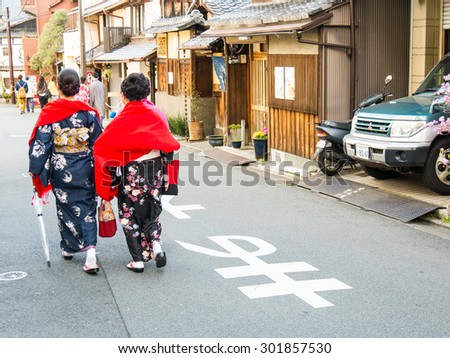 KYOTO, JAPAN - MARCH 24: Unidentified Japanese ladies with Kimono dress, Japanese traditional costume on March 24, 2015 in Kyoto, Japan.