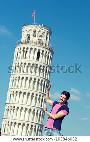 Young Man with Leaning Tower of Pisa, Italy