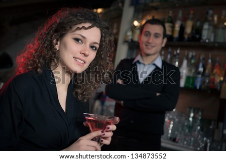 woman cheerful alone at disco club,Italy