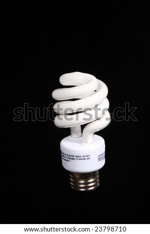 Neon energy saver light bulb with a black background.