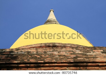 Yellow cloth cover pagoda at Wat Yai Chaimongkol, Ayuthaya, Thailand.