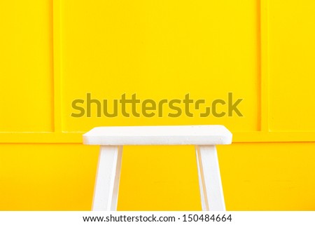 Yellow Background and chair for stand