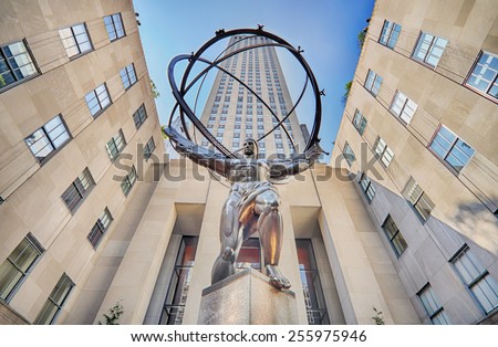 NEW YORK CITY, NY - OCT 30: Atlas statue and Rockefeller Center on October 30, 2014 in New York City. Rockefeller Center is a complex of 19 commercial buildings located in Midtown Manhattan.
