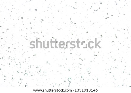Transparent gel with bubbles close-up. The texture of gel cream. Oxygen bubbles in clear blue water, close-up. Mineral water. Water enriched with oxygen. Stock foto © 
