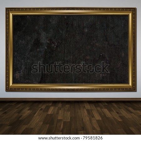 Large gold picture frame hanging on the wall