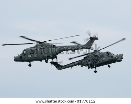 SUNDERLAND, UK - JULY 31: Royal Navy helicopters perform at the Sunderland International Airshow on July 31, 2011 in Sunderland, UK.