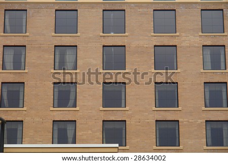 A picture of a window patterns on side of building