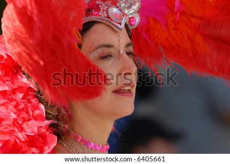 Dancer with big red feather hat