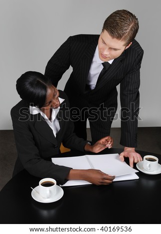 This is an image of a multi ethnic business team planning ahead.