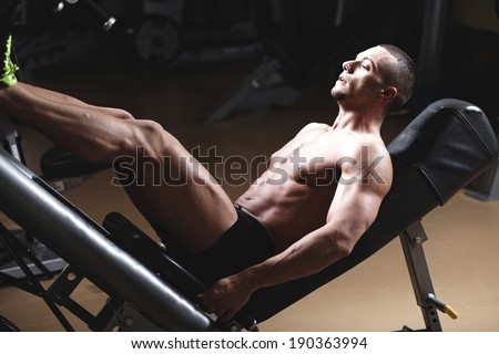 Muscular Man Calves - Bodybuilders Legs Shot In A Gym In Workout