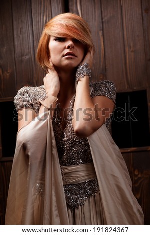 Fashion portrait of young beautiful woman in the elegant dress .Romantic style photo of a beautiful blonde girl