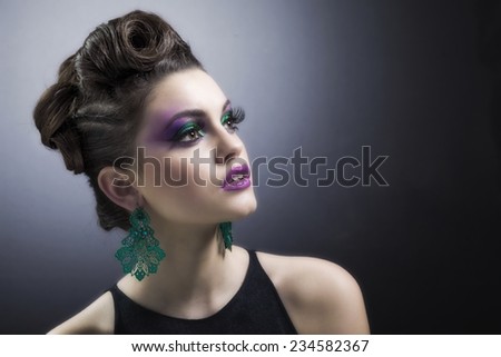 Beautiful face of young  woman with clean fresh skin. Beauty Model Woman Face. Perfect Skin. Professional Make-up.Makeup. Fashion Art