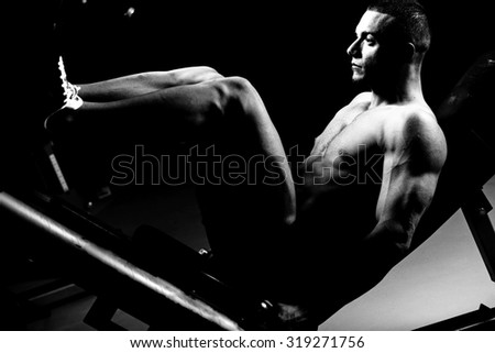 Muscular Man Calves - Bodybuilders Legs Shot In A Gym In Workout