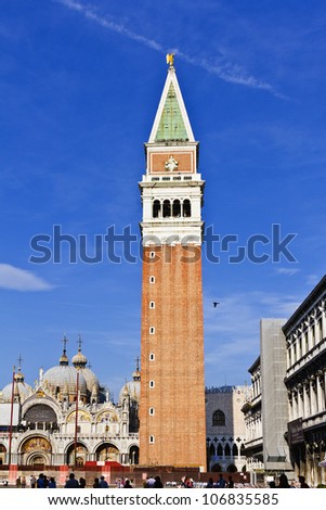 VENICE, ITALY - MAY 4: San Marco Campanile (bell tower of Saint Mark Basilica) on Piazza San Marco - one of famous symbols in Venice. The tower is 98.6 meters tall. Venice, Italy, May 4, 2012