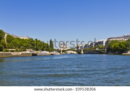 Cite Island and Cathedral Notre Dame de Paris. Cathedral Notre Dame de Paris Ã¢Â?Â? most famous Gothic, Roman Catholic cathedral (1163-1345) on the eastern half of the Cite Island. France, Europe.