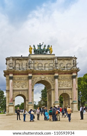 PARIS - JULY 13:Triumphal Arch (Arc de Triomphe du Carrousel) at Tuileries gardens in Paris, France on July 13,2012. Monument was built between 1806-1808 to commemorate Napoleon\'s military victories.