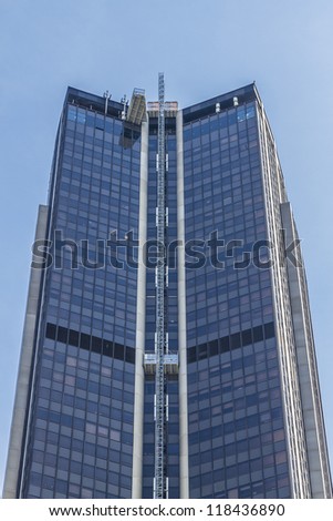 PARIS - JULY 23: Tour Montparnasse (constructed 1969 - 1972)  210m, 59 floors office skyscraper on July 23, 2012 in Paris, France. Architects: Eugene Beaudouin, Urbain Cassan and Louis Hoym de Marien
