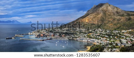 Aerial view of Simon's Town and its harbor. Simon's Town (Simonstad or Simonstown) - town near Cape Town, it is located on shores of False Bay, on eastern side of the Cape Peninsula. South Africa. Stock fotó © 