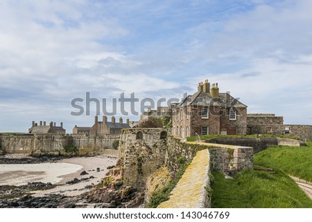 View of Lower Ward of Elizabeth Castle at low tide. Elizabeth Castle (1594) - castle and tourist attraction on a tidal island within parish of Saint Helier, Jersey, UK.