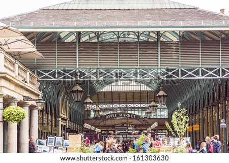 LONDON - MAY 31, 2013: View of Covent Garden market. Covent Garden - one of the main tourist attractions in London - is known for its restaurants, pubs, market stalls and shops.