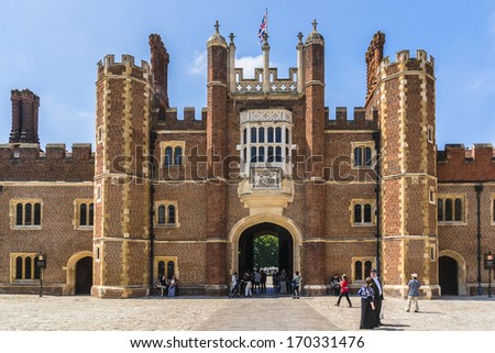 LONDON, UK - JUNE 4, 2013: Architectural fragment of entrance to Hampton Court Palace. Hampton Court was originally built for Cardinal Thomas Wolsey - a favorite of King Henry VIII, circa 1514.