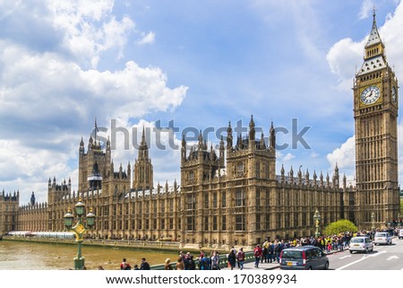 LONDON, UK - MAY 25, 2013: Beautiful view of Westminister Bridge and Big Ben with Parliament Houses. Big Ben tower, with 96.3 meters high, is the most important attraction of London.