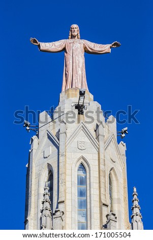 Jesus Christus Statue (by Josep Miret) at Expiatory Church of the Sacred Heart of Jesus (Temple Expiatori del Sagrat Cor) on summit of Mount Tibidabo in Barcelona, Catalonia, Spain.