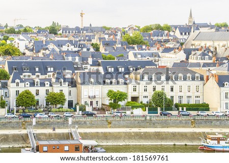 Panoramic view of Angers on river Maine in Maine-et-Loire department at sunset. France. Angers was before the French Revolution the capital of the province of Anjou.