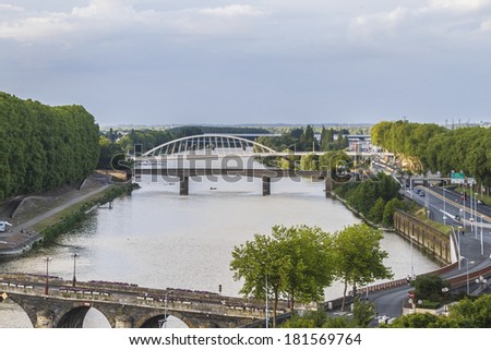 Panoramic view of Angers on river Maine in Maine-et-Loire department at sunset. France. Angers was before the French Revolution the capital of the province of Anjou.