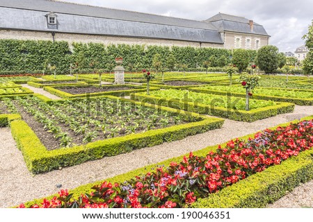 VILLANDRY, FRANCE - JULY 20, 2012: Traditional French garden. Ornamental Garden. Chateau de Villandry - castle-palace in department Indre-et-Loire, France. He is a world known for its amazing gardens.