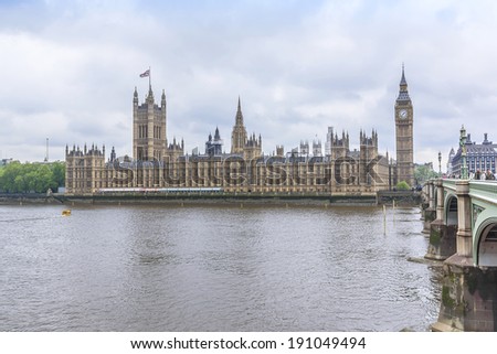 River Thames and Palace of Westminster (known as Houses of Parliament). Palace of Westminster located on Middlesex bank of River Thames in City of Westminster, London.