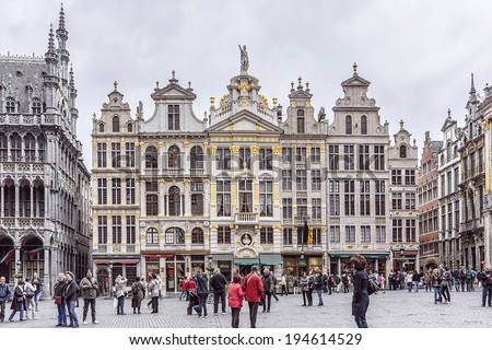 BRUSSELS, BELGIUM - MAY 11, 2014: Houses of the famous Grand Place (Grote Markt) - the central square of Brussels. Grand Place was named by UNESCO as a World Heritage Site in 1998.
